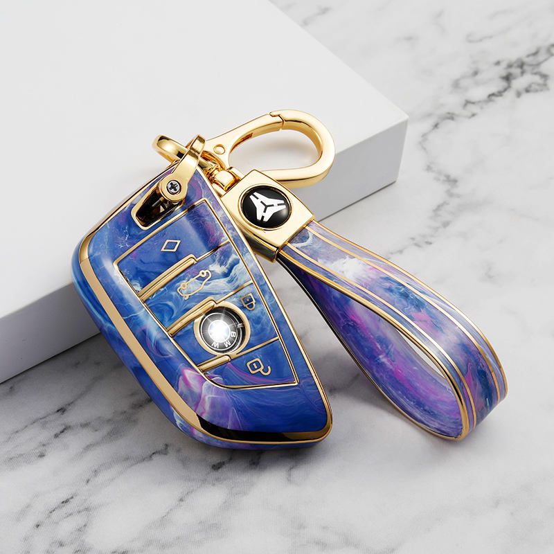 Cache bouton 4 boutons violet + porte-clés TPU