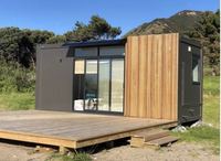 Maisons préfabriquées conteneur moderne avec pont supérieur et escaliers expédition maisons modulaires en bois porte de revêtement de maison