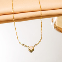 Collier tendance en acier inoxydable hypoallergénique imperméable avec pendentif trèfle à quatre feuilles en zircon, chaîne en corde pour femmes