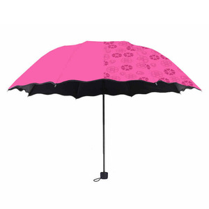 Sun <b>Umbrella</b> Three Fold Portable Folding Manual Open Travel Use Water Resistant Black Silver Coated <b>Umbrella</b> - Product Image 1