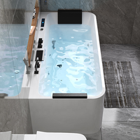 Baignoire balnéo rectangulaire autoportante en acrylique avec jets hydromassants et robinet pour salle de bain intérieure