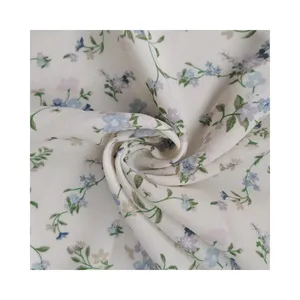 Hot Selling 100% Polyester 160gsm Beige White Background With Fresh Small Floral Patterns Jacquard Fabric For Dresses