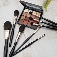 Ensemble professionnel de 8 pinceaux de maquillage de luxe en or rose avec bidon en PU cheveux bruns mélangés Logo personnalisé pour application cosmétique