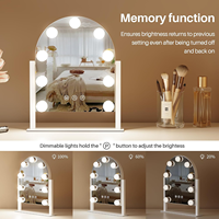 Miroir de maquillage sur pied personnalisable à écran tactile, design arqué, cadre métallique, avec 9 ampoules LED réglables