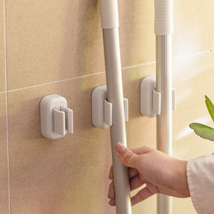 Ganchos Adhesivos Blancos Prácticos para Montar en la Pared, para Escobas y Fregonas de Cocina, Resistentes al Agua, Venta al Por Mayor - Product Image 1