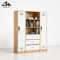Armoire de bureau avec portes latérales verrouillables, étagères ouvertes, trois tiroirs et compartiments ventilés pour usage domestique ou professionnel