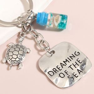 Llavero marino con concha, estrella de mar y caracola, botella de líquido en movimiento, llaveros de los deseos, regalos de amistad, joyería hecha a mano - Product Image 4