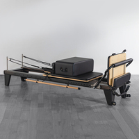 SANDAN lit d'entraînement Pilates portable personnalisé en alliage d'aluminium avec lit central confortable pour une utilisation en studio Pilates