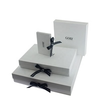 Boîte cadeau en papier gaufré laminé blanc mat pliable à plat Gobi Cashmere avec emballage personnalisé pour chaussettes, fourrure, ruban inclus