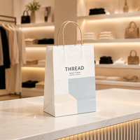 Sac en papier blanc personnalisé pour magasin de vêtements de mode, sac cadeau en papier artistique personnalisé