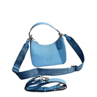 2025 marque de créateur de luxe demi-lune motif sac à bandoulière pour les femmes à la mode sous les bras épaule en cuir pour l'été