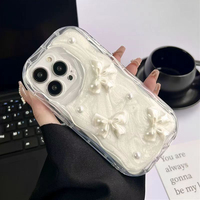 Étui de téléphone portable de luxe transparent à bords ondulés avec nœud perlé antichoc pour iPhone 16 15 14 Pro Max Plus