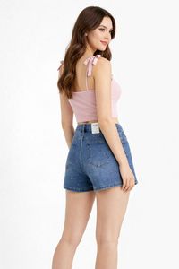 Cómodos shorts de mezclilla de cintura alta y corte ajustado con adornos de pedrería, perfectos para el verano. - Product Image 2