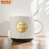 Tasse à café en céramique avec médaille en bronze gaufré de 500ml au design moderne avec logo tasse à café en céramique tasse à lait de luxe en porcelaine