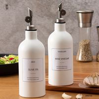 Bouteilles d'huile en céramique personnalisées de couleur unie pour la cuisine, articles ménagers, stockage, avec couvercle, sauce, vinaigre, huile d'olive, vente en gros