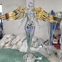 Sculptures de statue d'action de robot sexy en fibre de verre personnalisées pour décoration d'intérieur de bar de club Sculpture de robot de dame nue pour la déco de cinéma