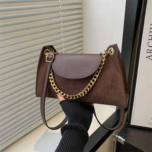 กระเป๋าสะพายข้างผู้หญิงแบบใหม่ ปิดด้วยกระดุม สไตล์เรโทร กระเป๋าถือใต้วงแขนแบบพกพา - Product Image 1