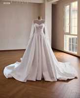 Robe de mariée moderne musulmane Feishiluo avec taille naturelle, manches longues, perles de cristal et traîne chapelle en satin