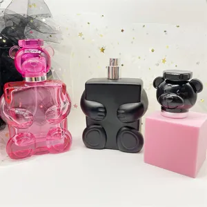 100ml भालू आकार काले रंग गुलाबी ग्लास इत्र कॉस्मेटिक बोतलें प्लास्टिक के ढक्कन के साथ कवर