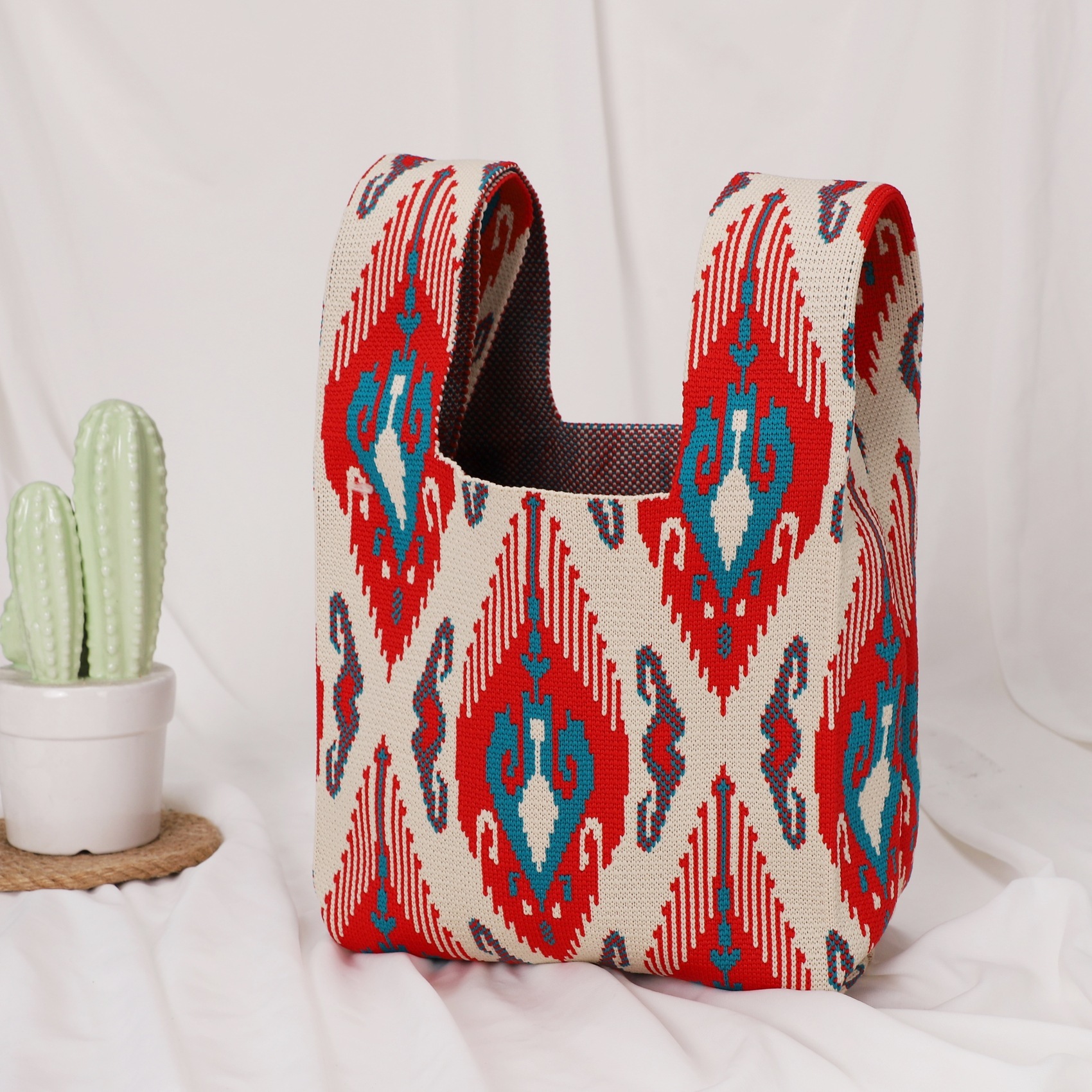 Pochette à riz rouge-vert à motif losanges