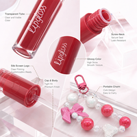 Tube de brillant à lèvres OEM/ODM avec bracelet en forme de nœud, étiquette privée, capuchon double cœur, brillance non collante, logo personnalisé, sérigraphie