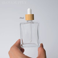 Flacon compte-gouttes carré en verre transparent de 15 ml, 30 ml, 50 ml, 100 ml avec bouchon en bambou naturel, rechargeable, pour huiles, ensembles écologiques en gros