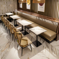 Table de salle à manger commerciale de luxe moderne en acier inoxydable avec pieds dorés et plateau en pierre frittée marbrée pour café et école