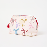 Sac de voyage portable personnalisé avec logo, pochette de toilette à pompon pour femme, sac à maquillage imprimé nœud pour femme, vente en gros