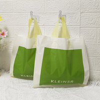 Sacs en plastique en gros en stock pour boutiques de vêtements