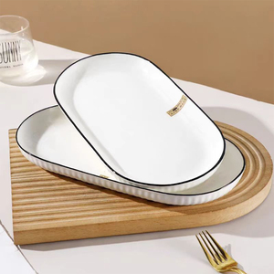 Assiette ovale de <span class=keywords><strong>poisson</strong></span> à double oreille en céramique blanc pur créatif de haut niveau d'apparence vaisselle - Product Image 1