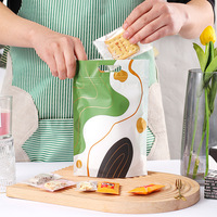 Sac refermable autoportant en forme de flocon de neige de dessin animé, imprimé UV, de qualité alimentaire, pour nougat, biscuits, lait, dattes, bonbons