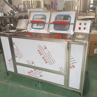 Laveuse semi-automatique de bouteilles 20L à double station en acier inoxydable avec grande cuve pour le nettoyage de l'eau pure