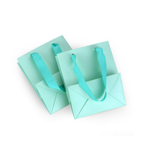 Sacs à provisions en papier d'art de luxe personnalisés pour bijoux artisanat bougie style classique avec votre propre logo pour emballage de cadeau d'affaires