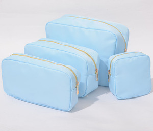 Set di 4 Borse da Toilette Impermeabili in Nylon Blu Ghiaccio, Taglie <span class=keywords><strong>S</strong></span> M L <span class=keywords><strong>XL</strong></span>, Senza MOQ, Organizer per Accessori, Regali, Borse da Viaggio per Cosmetici e Trucchi - Product Image 1