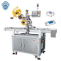 Machine d'étiquetage automatique de surface supérieure SKILT pour l'emballage des sacs et des pochettes |   Applicateur d'autocollants de haute précision pour produits plats