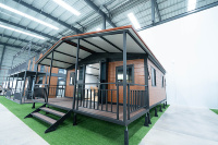 Maison conteneur pliable à double aile extensible, conception sur mesure, villa préfabriquée avec intérieur personnalisé pour hôtel de charme