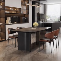 Style minimaliste moderne : la combinaison parfaite d'une table à manger gris foncé et de sièges en cuir.