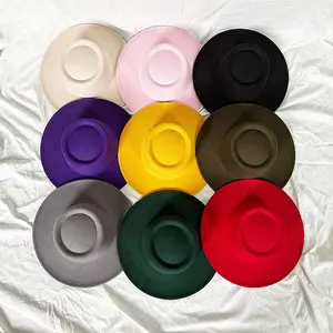 สีทึบผ้าฝ้ายโพลีเอสเตอร์มังสวิรัติวัสดุหมวก Fedora โลโก้ที่กําหนดเองขนสัตว์ปีกกว้างผู้หญิงผู้ชายเทศกาลหมวก Fedora ที่หรูหรา