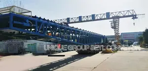 Mesin sistem konveyor sabuk tumpuk seluler solusi penanganan besar kapal teleskopik Industrial harga mesin