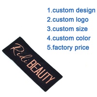 Pochette en velours noir avec bouton pression et logo or rose personnalisé pour bijoux