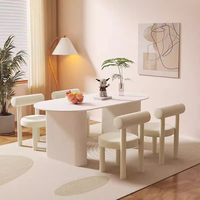 Table à manger moderne de luxe en roche frittée, style crème, design ovale simple, chaises confortables, pieds en métal, pour 4 personnes, usage domestique