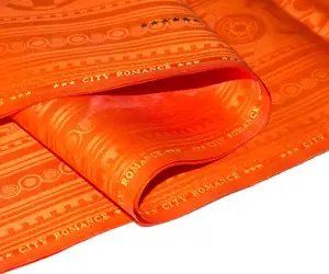 Glans Oranje Kleur Naaimateriaal Zeer Comfortabel 100% Katoen Abaya Jacquard Stof Voor Jurk Met Parfum In 2024 Nieuwe Ontwerp