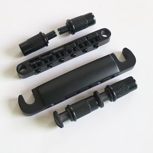 Donlis TOM002 Puente de <span class=keywords><strong>guitarra</strong></span> LP negro Tune-O-Matic Juego de piezas de cola para guitarras LP/SG/TL - Product Image 1