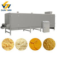 Ligne de production de snacks extrudés multifonctionnels en forme d'aiguille et en forme de tranches, à base de morceaux de pain