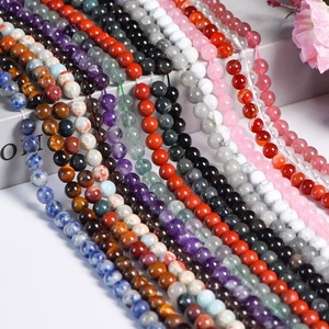 Großhandel Hot Sale dekorative Kristall perlen Rosenquarz Fossil Lapiz und verschiedene Materialien für die Schmuck herstellung - Product Image 1