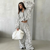 Ensemble de survêtement décontracté deux pièces pour femme, comprenant un sweat à capuche court et un pantalon large à imprimé floral en dentelle