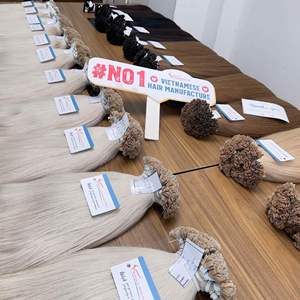 Matière première vierge vietnamienne Modèle de corps Style vague naturelle Ruban pré-collé Extensions de cheveux à pointe plate Meilleur prix Paquets de cheveux - Product Image 2