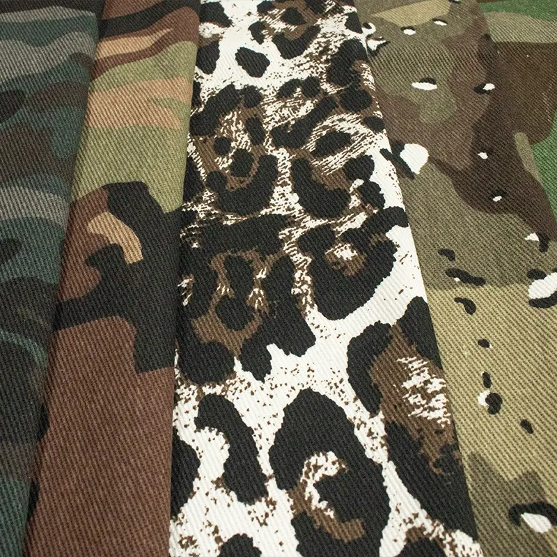 Tela vaquera con estampado de leopardo 280gsm 10*7 tela vaquera estampada con camuflaje 100% tela vaquera estampada de algodón