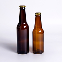 Vente en gros Bouteille de bière en verre transparent vide bon marché 330ml 33cl 12oz de soda ou de jus