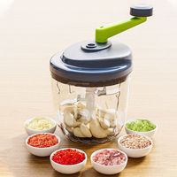 Handmatige plastic huishoudelijke keuken multifunctionele groentehakker vleesmolen handbediende snijmachine knoflookpers babyvoedselbereider